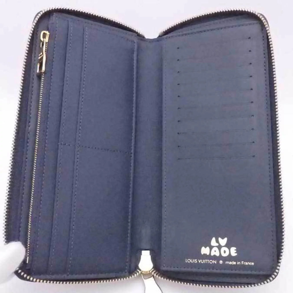 Pre-Owned Louis Vuitton LOUIS VUITTON Round Zipper Long Wallet Monogram Denim Zippy Vertical Leather/Monogram Navy x Blue Unisex M81107 (Good)