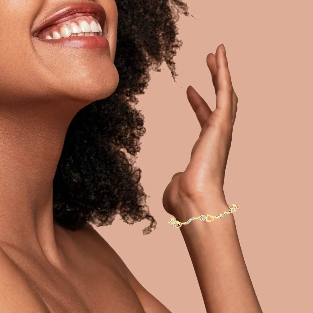 14K Yellow Gold Plated .925 Sterling Silver 1/10 Cttw Diamond Wave and Hearts 4"-10" Adjustable Bolo Bracelet (I-J Color, I3 Clarity)