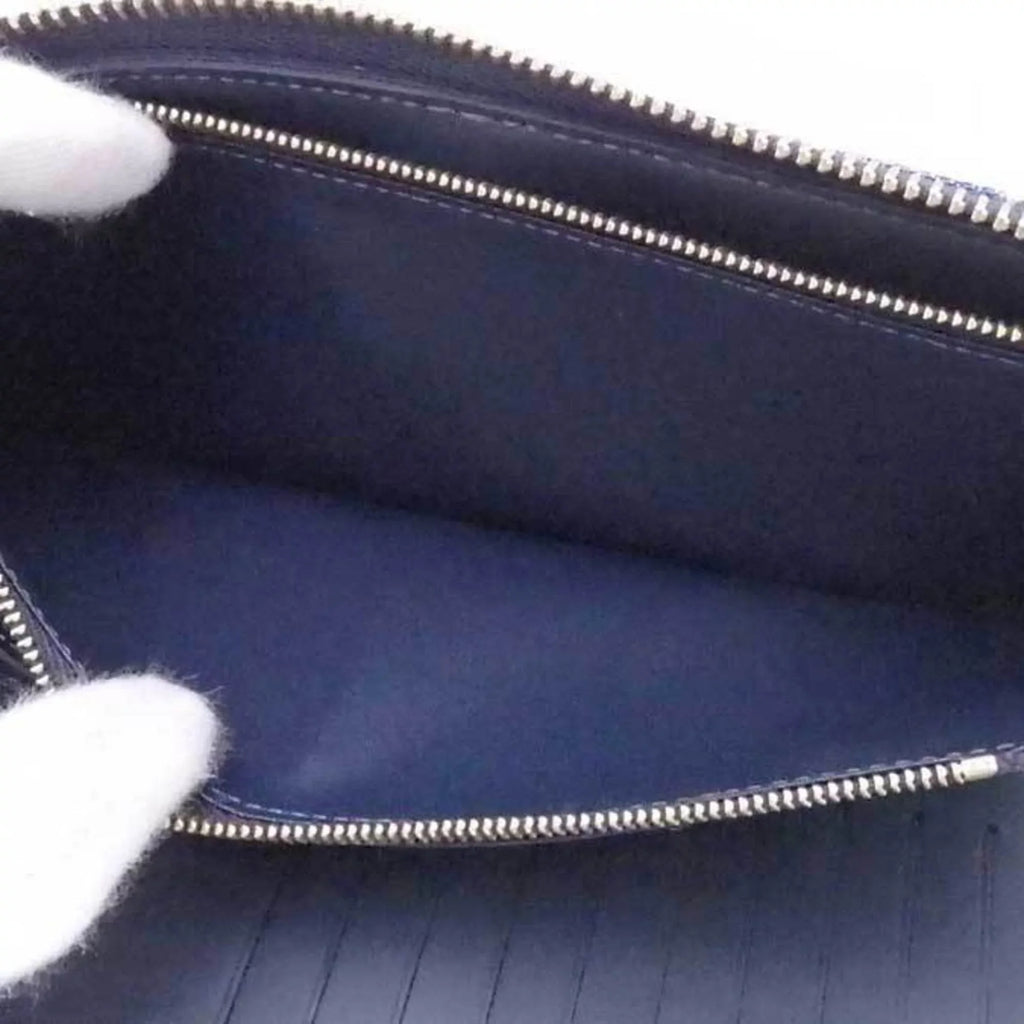 Pre-Owned Louis Vuitton LOUIS VUITTON Round Zipper Long Wallet Monogram Denim Zippy Vertical Leather/Monogram Navy x Blue Unisex M81107 (Good)